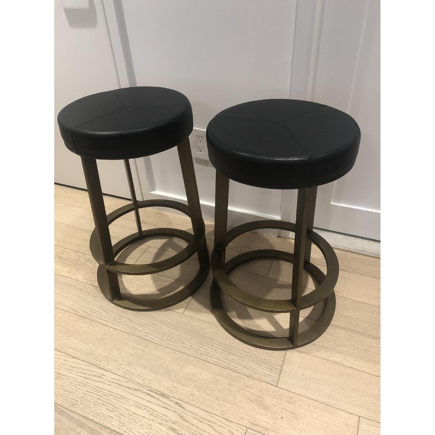 CB2 Leather Reverb Stools AptDeco