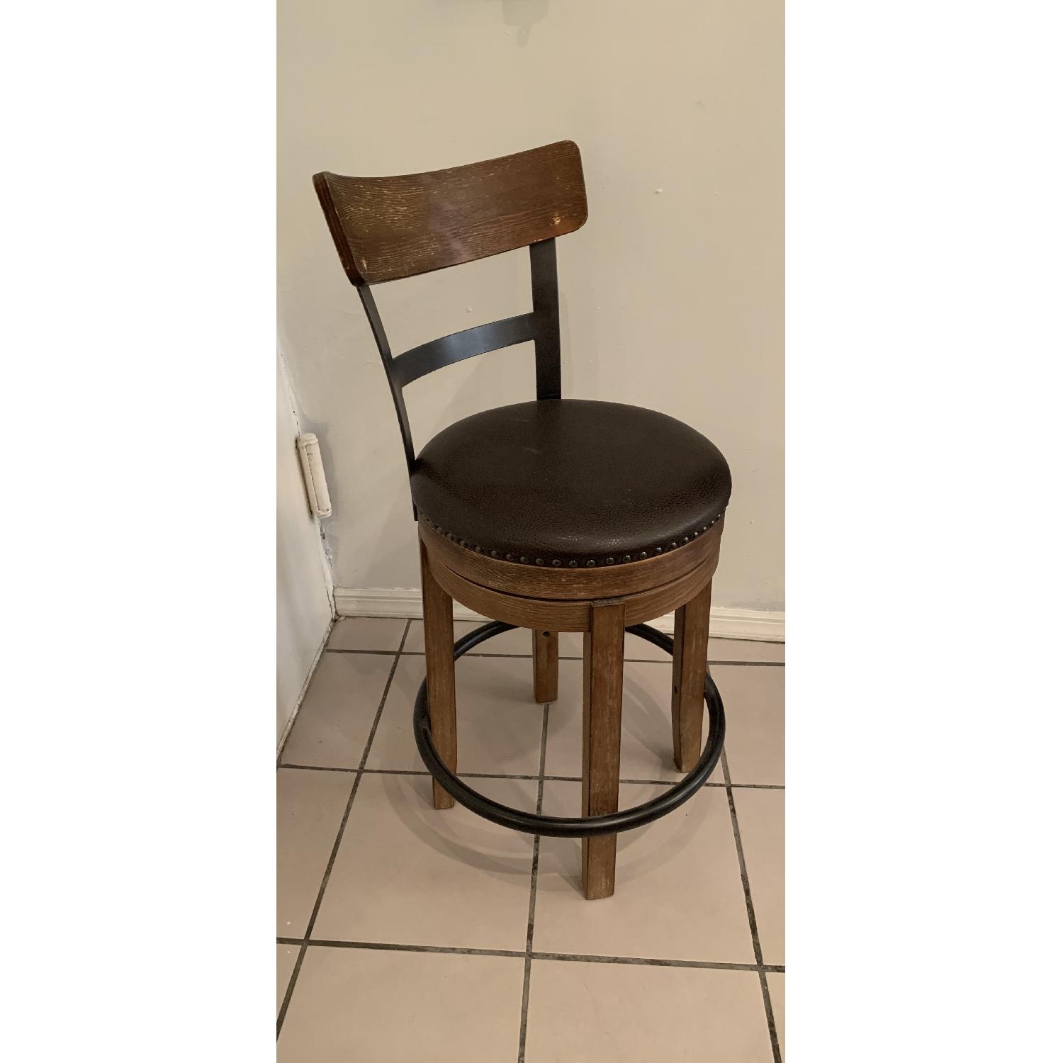 Ashley Furniture Pinnadel Counter Bar Stool - image-1