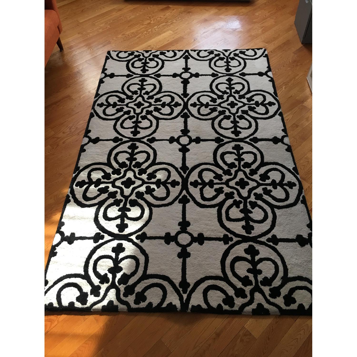 CB2 Black & White Patterned Area Rug AptDeco