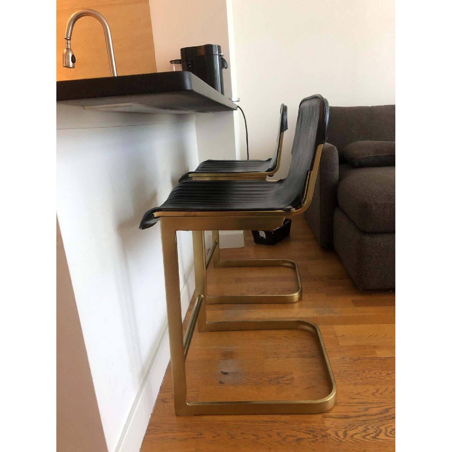 CB2 Rake Brass Counter Stools AptDeco