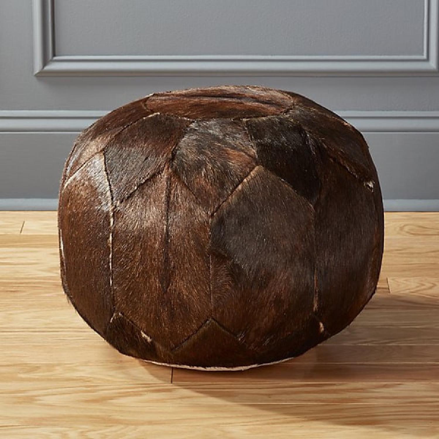 CB2 cowhide Moroccan-style pouf ottoman - image-1
