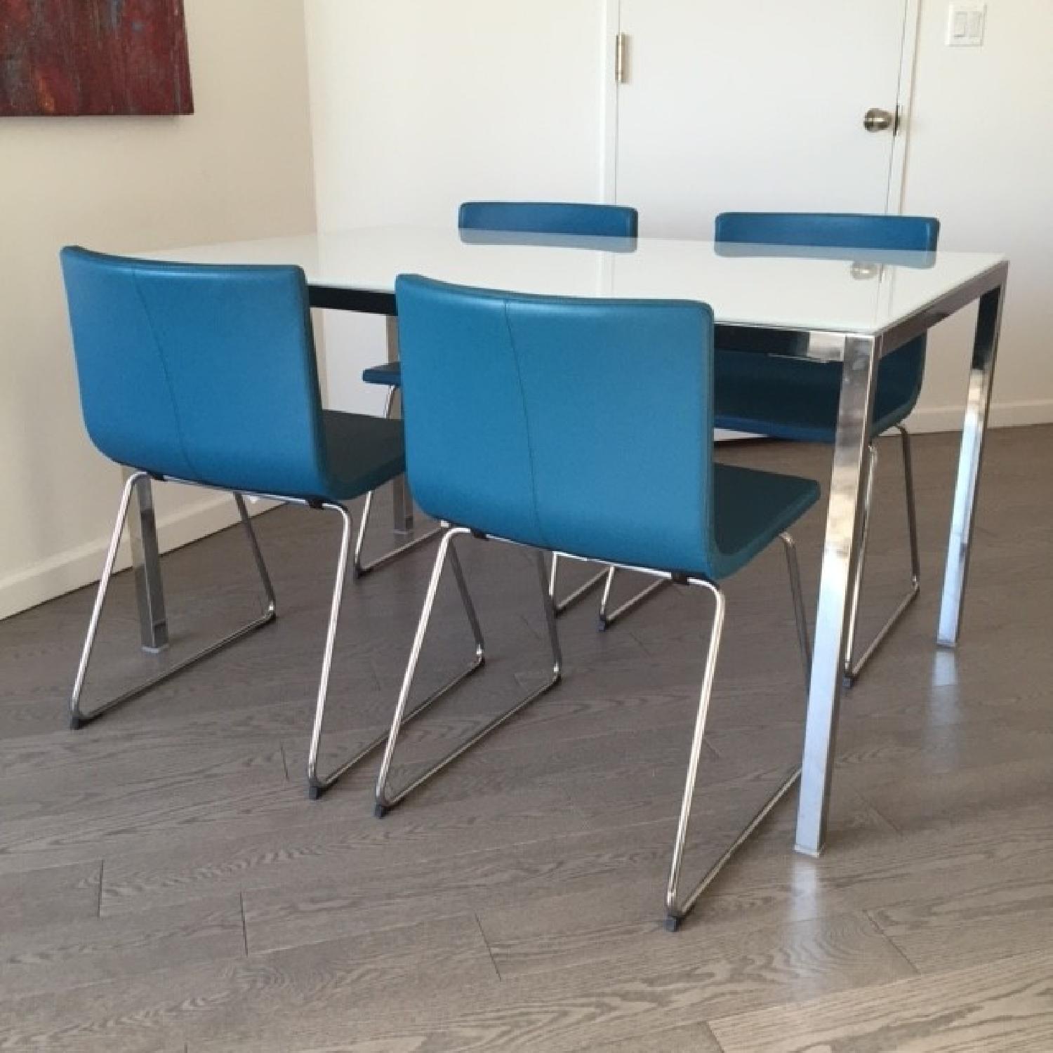 Ikea Glass/Chrome Table w/ 4 Leather/Chrome Chairs - image-1