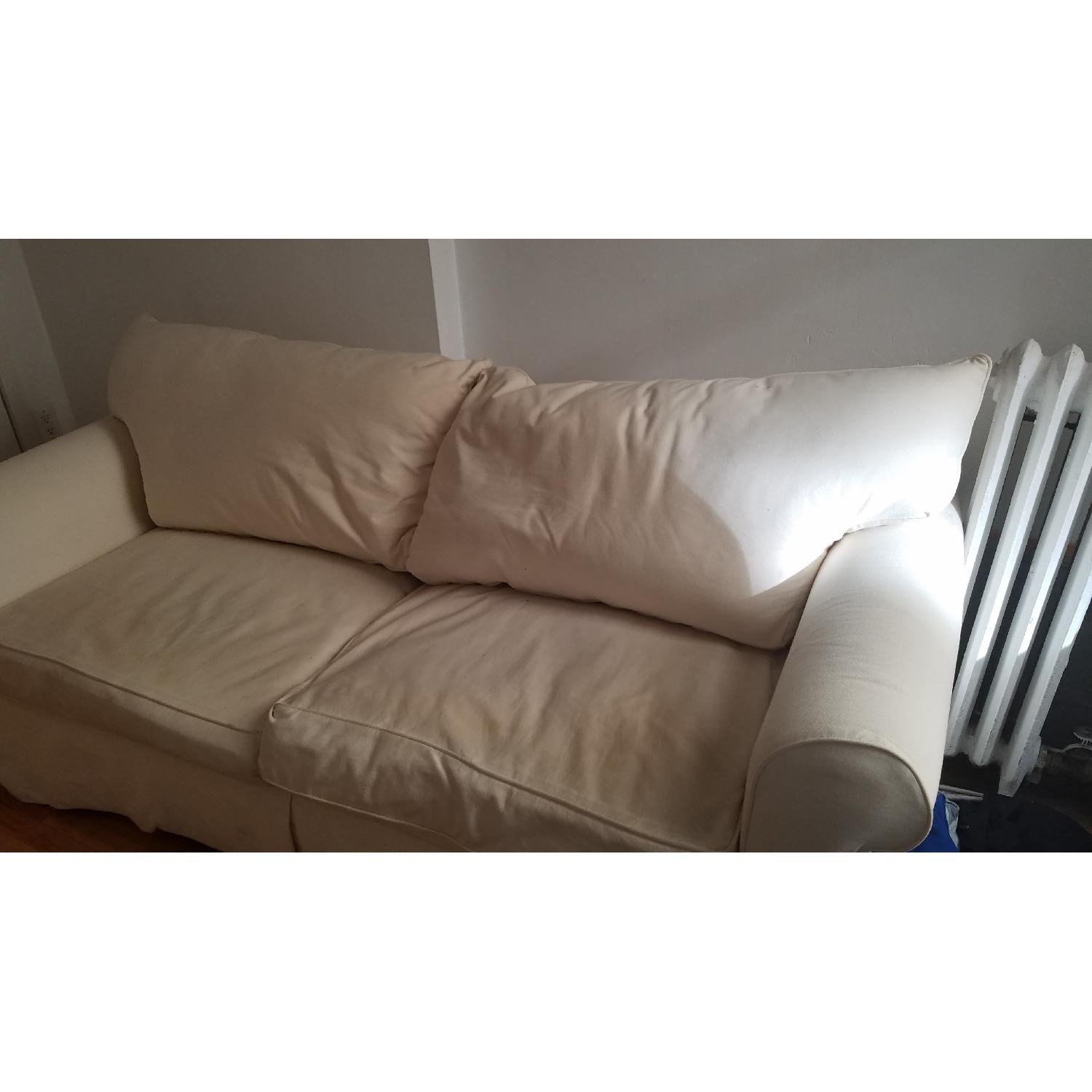 Jennifer Convertibles White Sofa w/ Pull Out Bed AptDeco