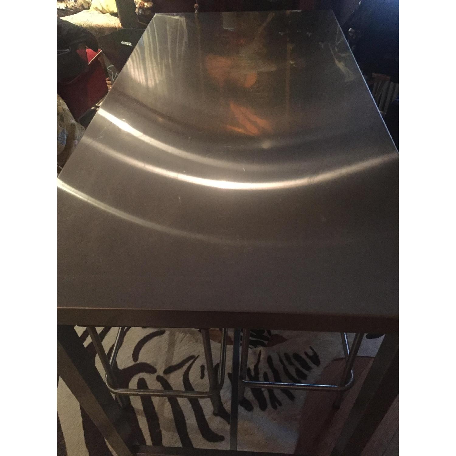 Ikea Stainless Steel Bar Table w/ 4 Stools AptDeco