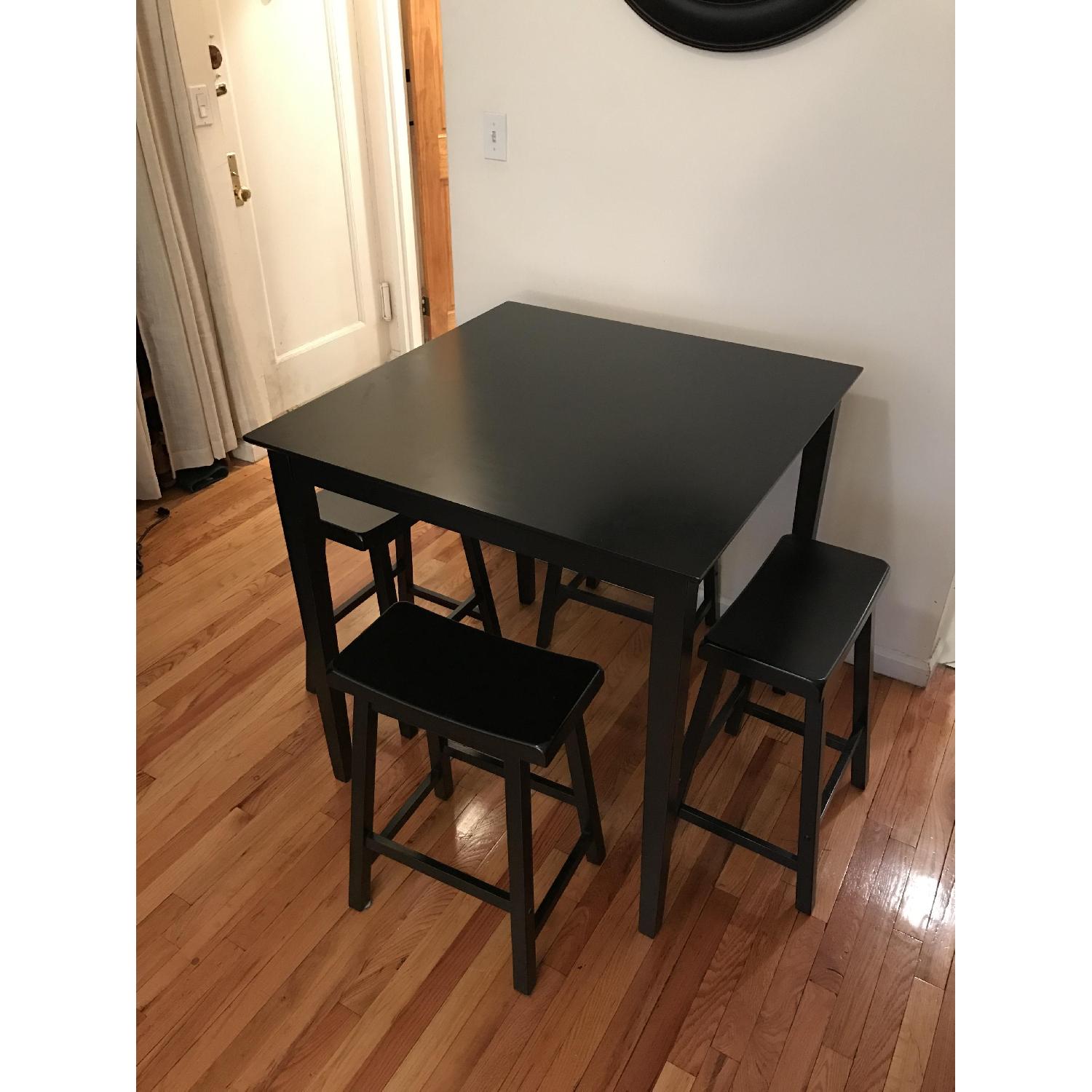 Ashley's Black Kitchen Table w/ 4 Stools AptDeco