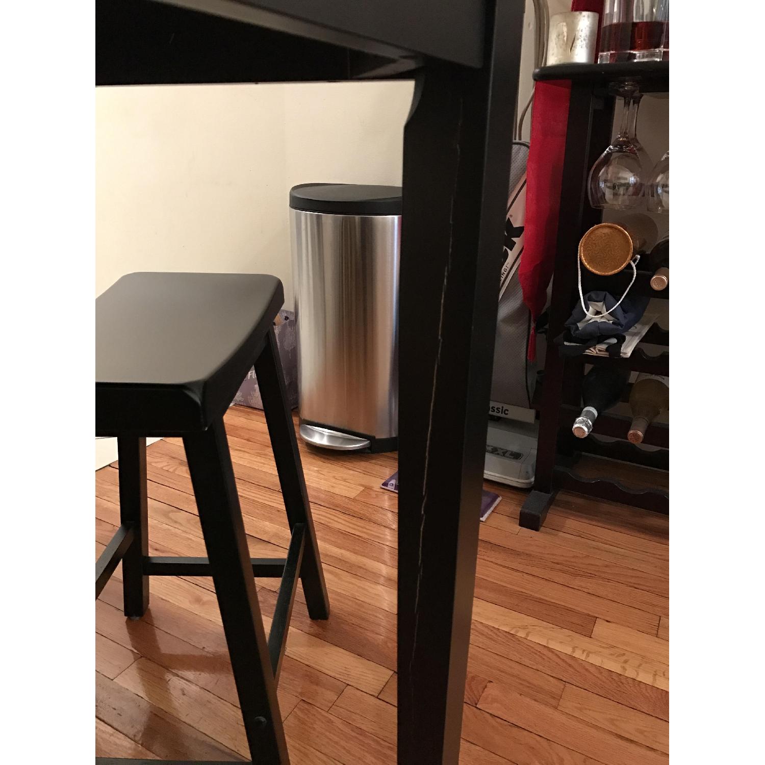Ashley's Black Kitchen Table w/ 4 Stools - image-5