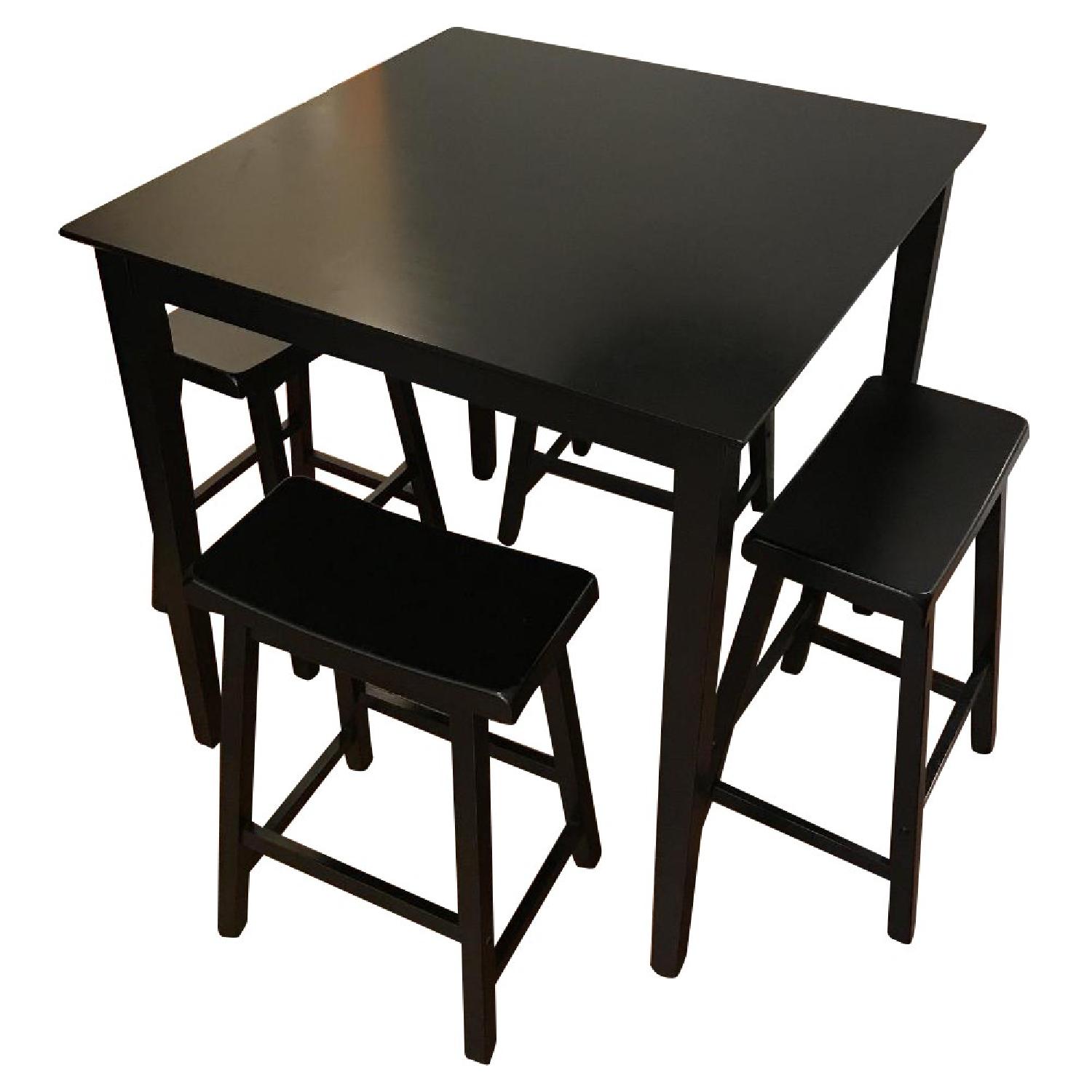 Ashley's Black Kitchen Table w/ 4 Stools AptDeco