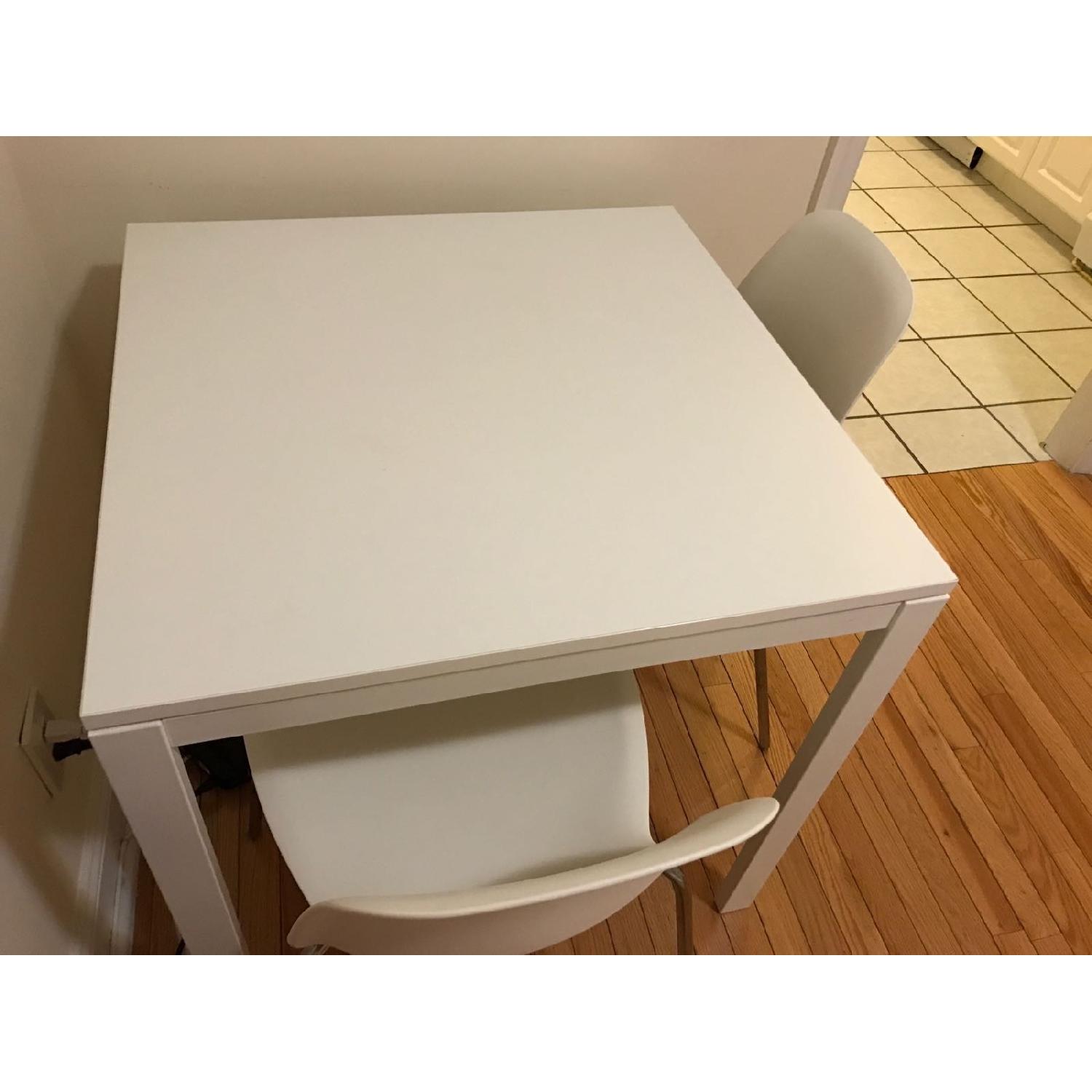 Ikea White Table w/ 2 Chairs AptDeco