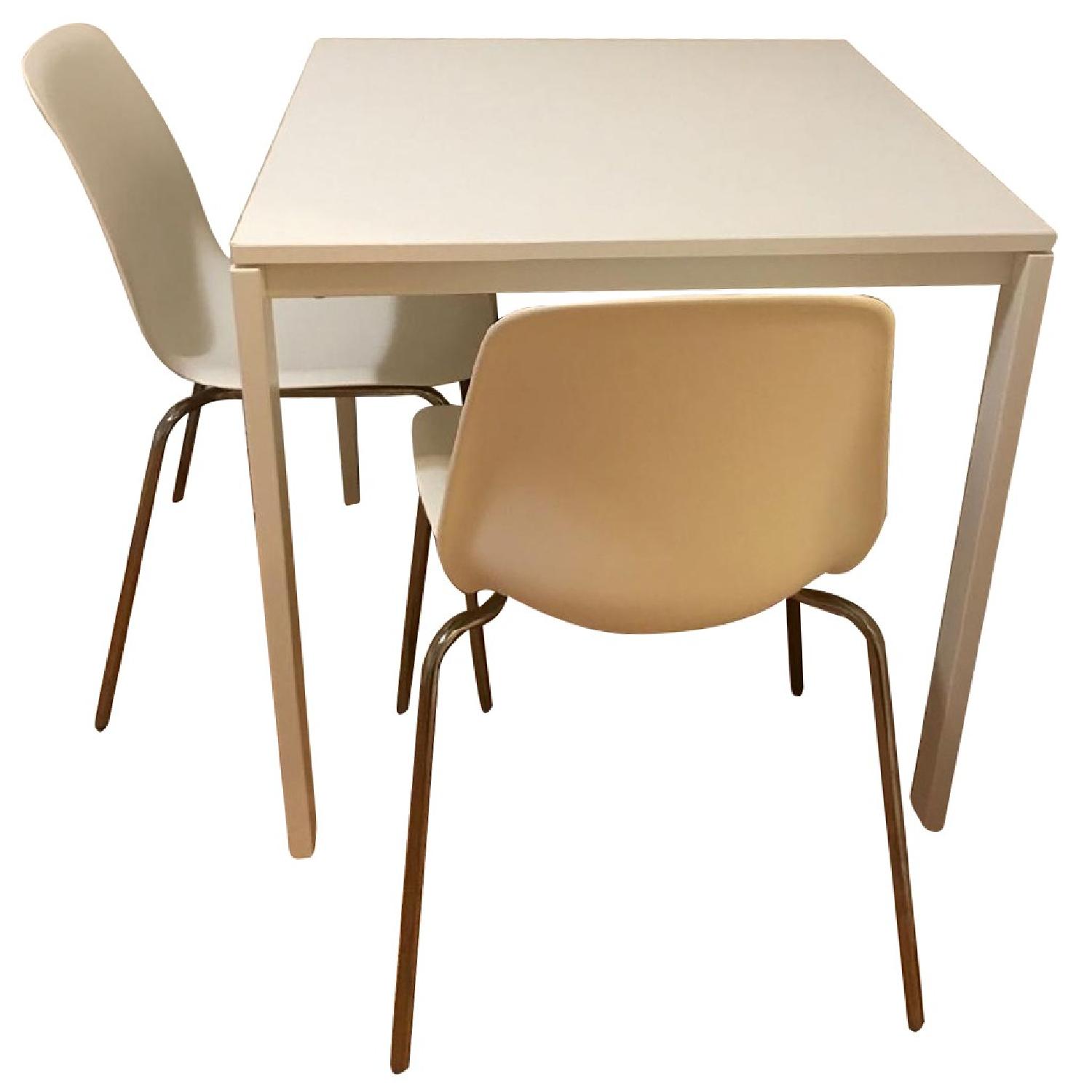 Ikea White Table w/ 2 Chairs AptDeco