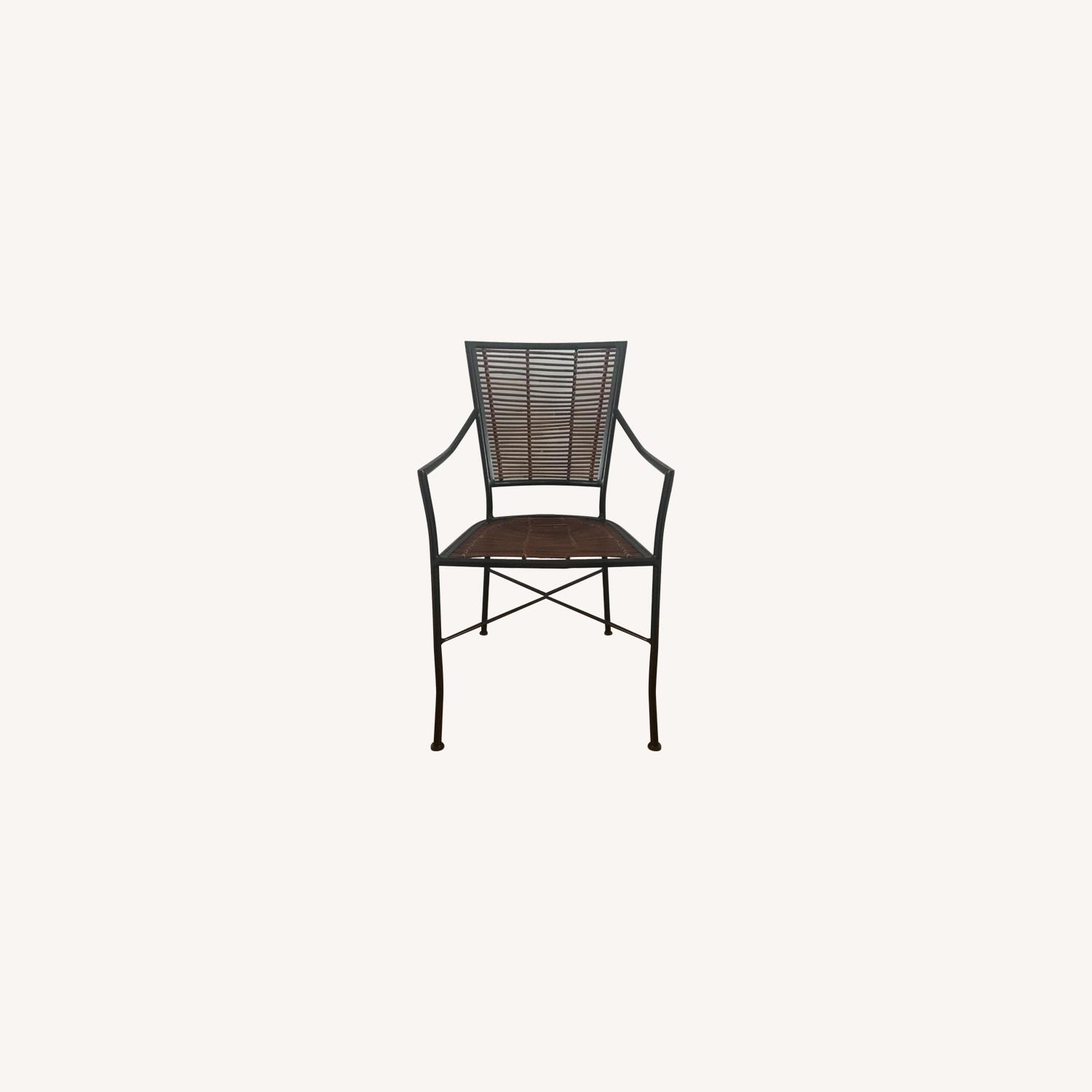Crate & Barrel Black Metal & Rattan Chairs AptDeco
