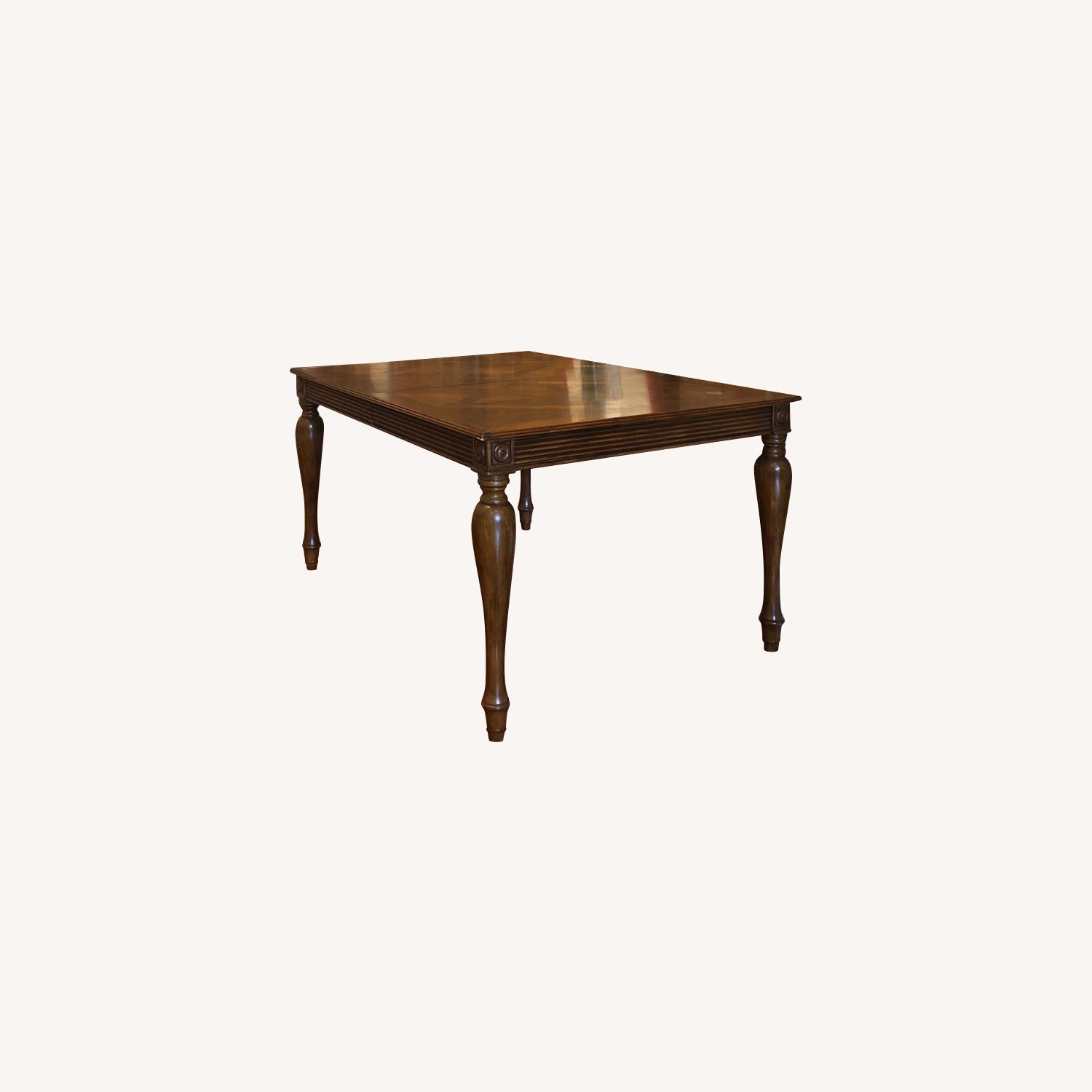 Antique Expandable Dark Wood Dining Table - AptDeco