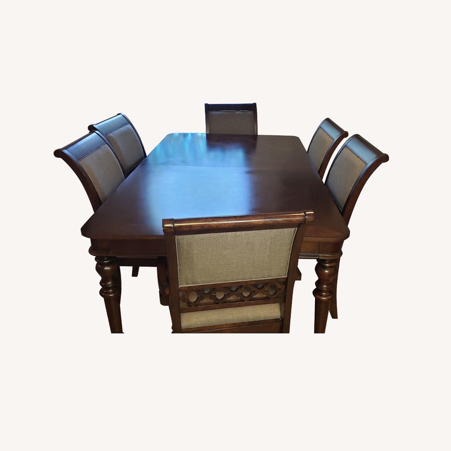 Solid Wood Expandable Dining Table w/ 8 Chairs - image-0