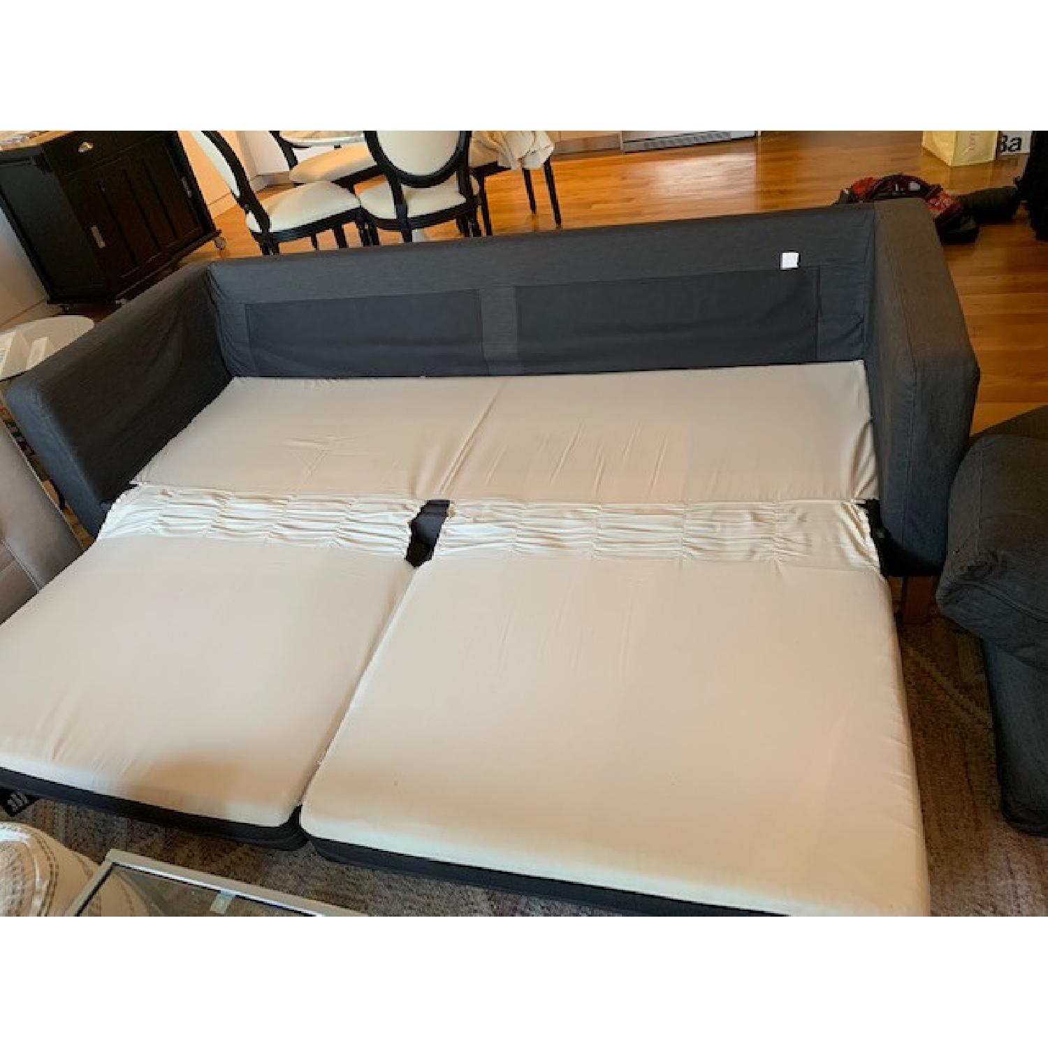 Ikea Karlstad Dark Grey Sleeper Sofa - AptDeco