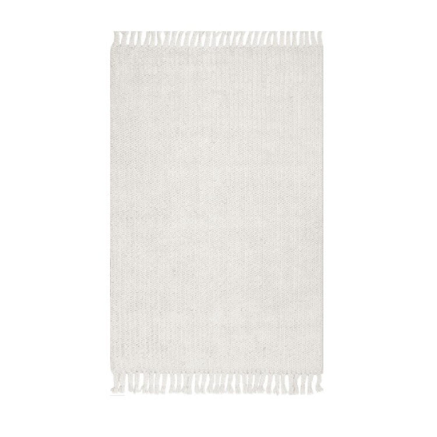 nuLOOM Off White Braided Tassel Rug AptDeco