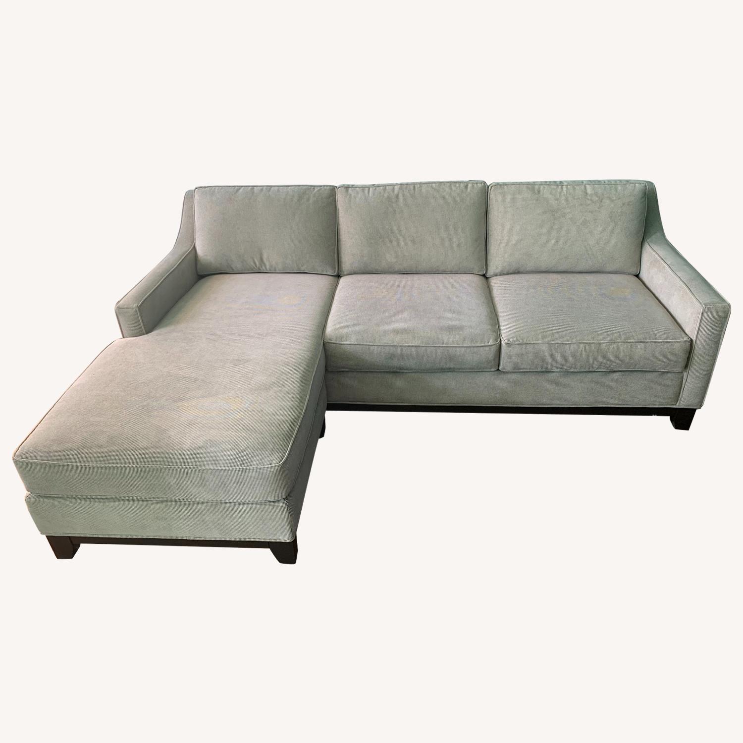 Raymour and Flanigan Sectional Sofa - AptDeco