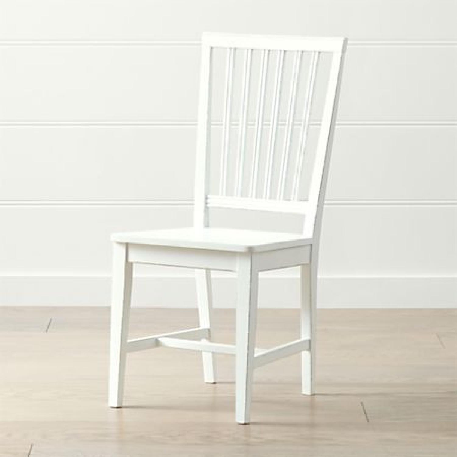 Crate and Barrel Village White Dining Chairs AptDeco
