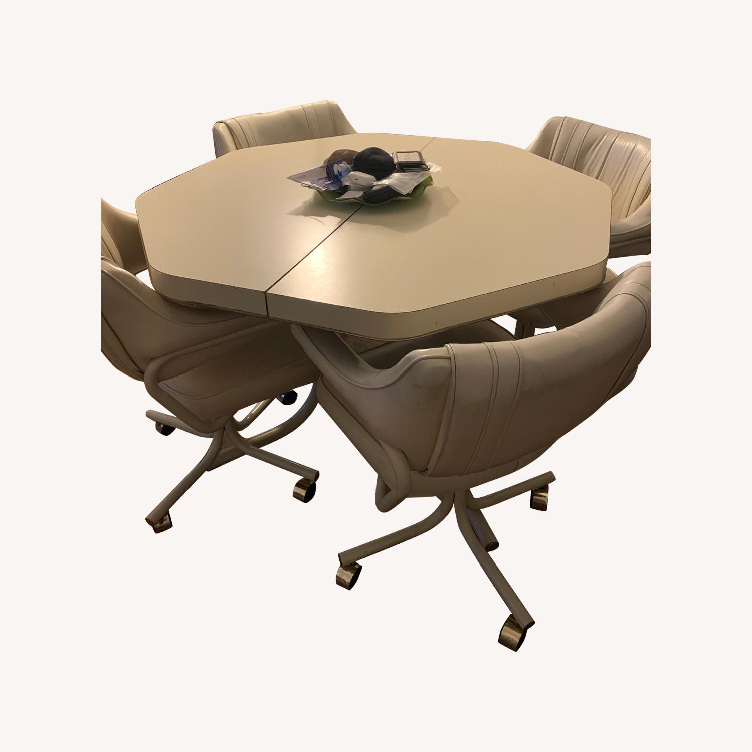 Expandable Dining Table and Chair set - AptDeco