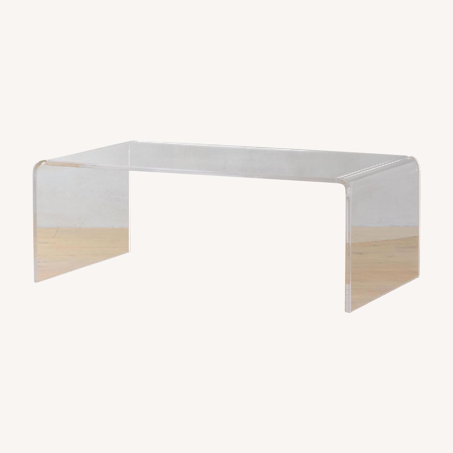 CB2 Peekaboo Acrylic Coffee Table AptDeco