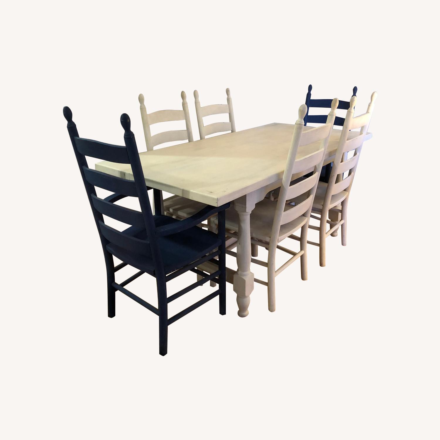 Solid Oak Trestle Dining Table with 6 Ladderback Chairs AptDeco