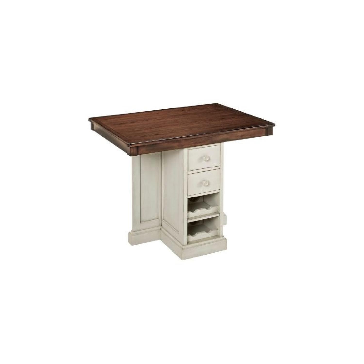 Raymour & Flanigan Wood Dining Table with Storage AptDeco