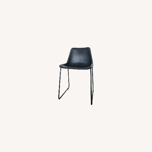 Used ABC Carpet and Home Black Leather Dining Chairs for sale on AptDeco