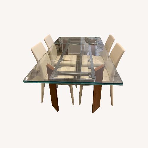 Used Calligaris Tower Extendable Table with Anais Leather Chairs for sale on AptDeco