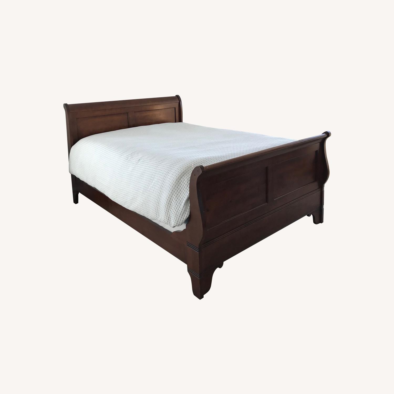Raymour & Flanigan Solid Wood Sleigh Bed AptDeco