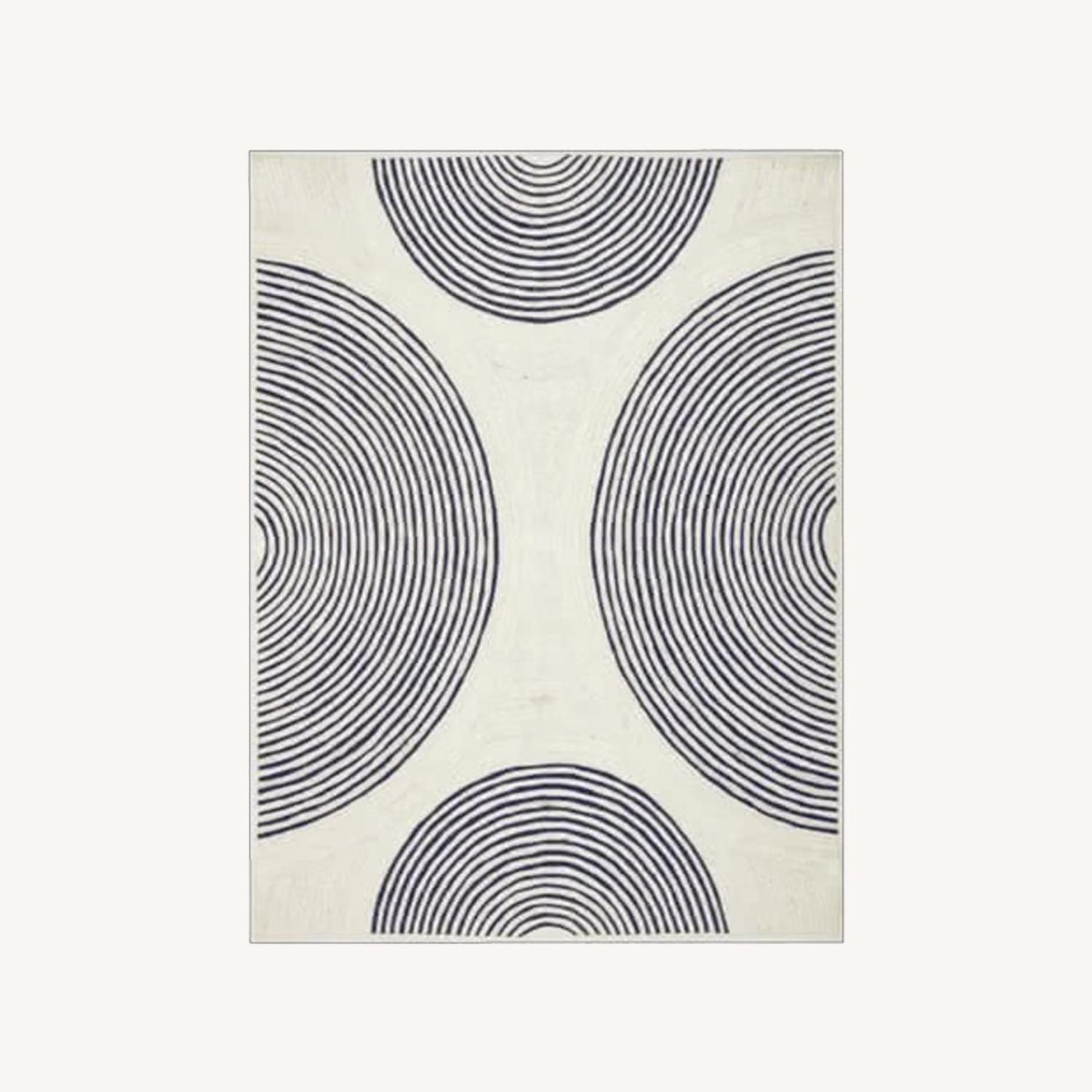 Ripple Design Rug West Elm Jute Ripple Circles Rug - AptDeco