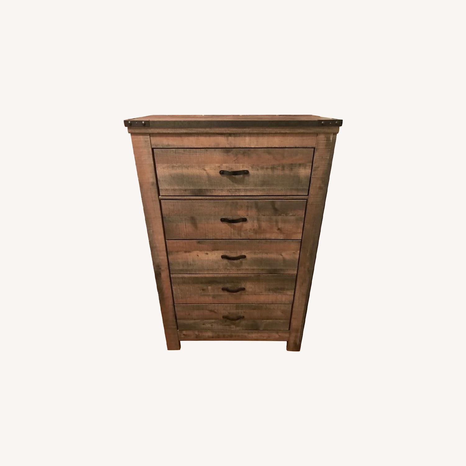 Ashley Home Furniture Trinell Chest of Drawers AptDeco