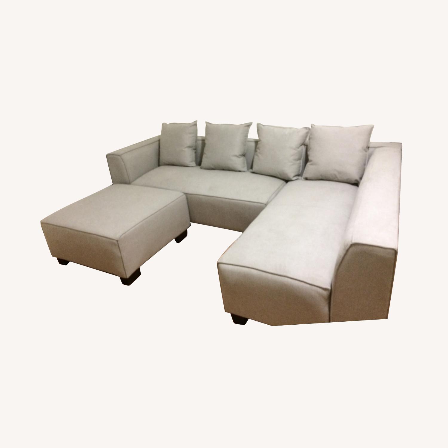 Right Hand Facing Modular Sectional with Ottoman - image-0