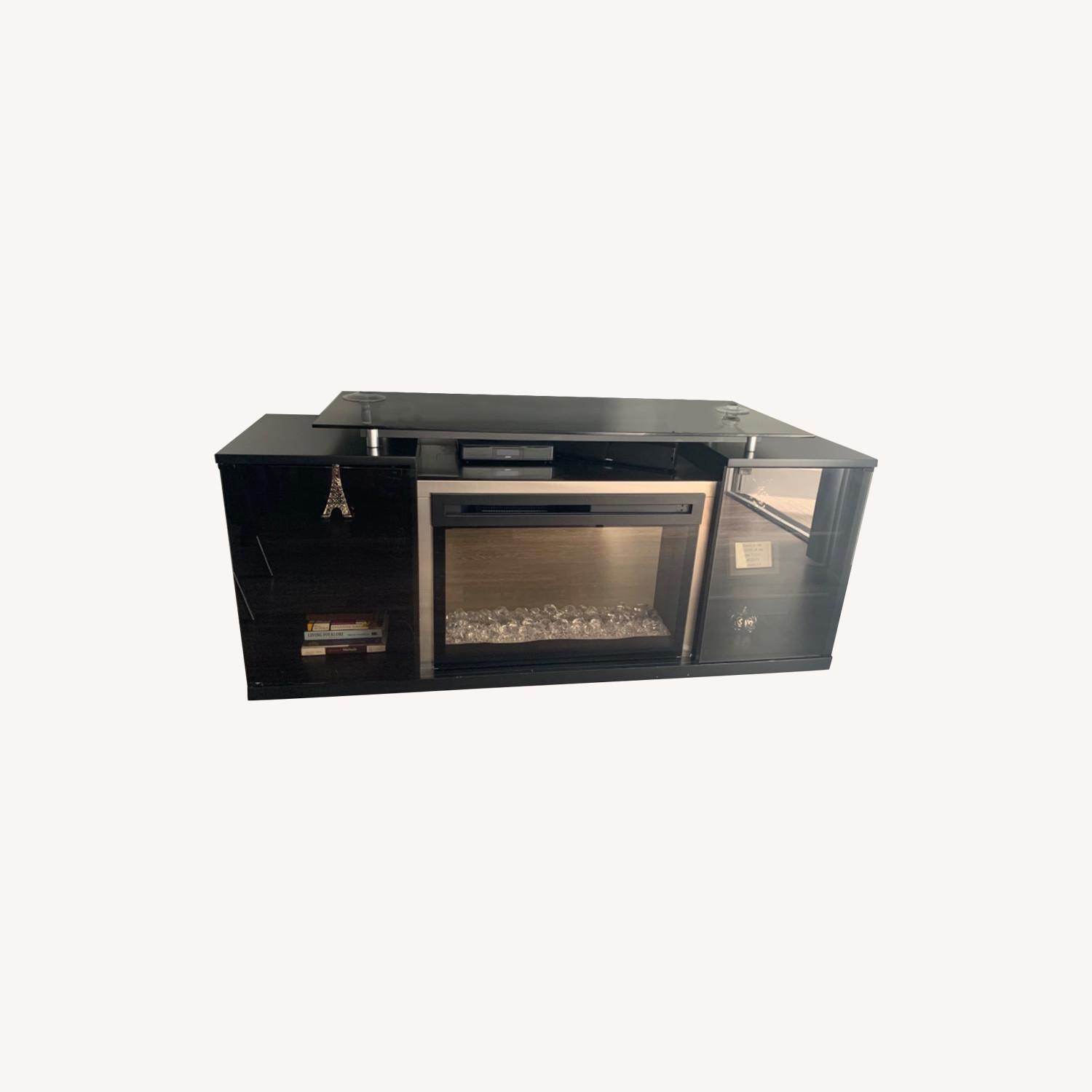 Raymour & Flanigan TV Stand with Fireplace AptDeco