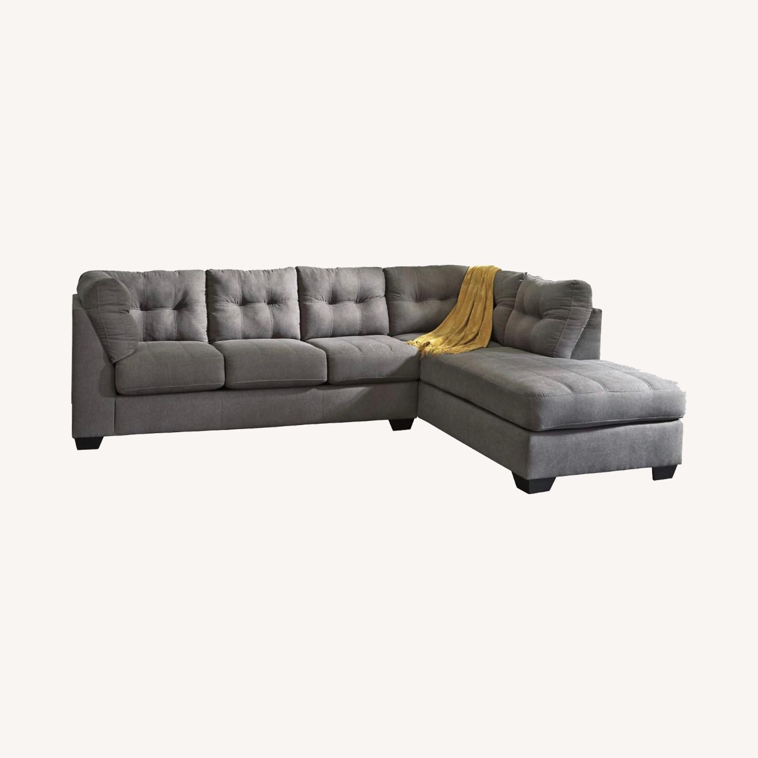 Raymour & Flanigan Dark Grey Sectional AptDeco