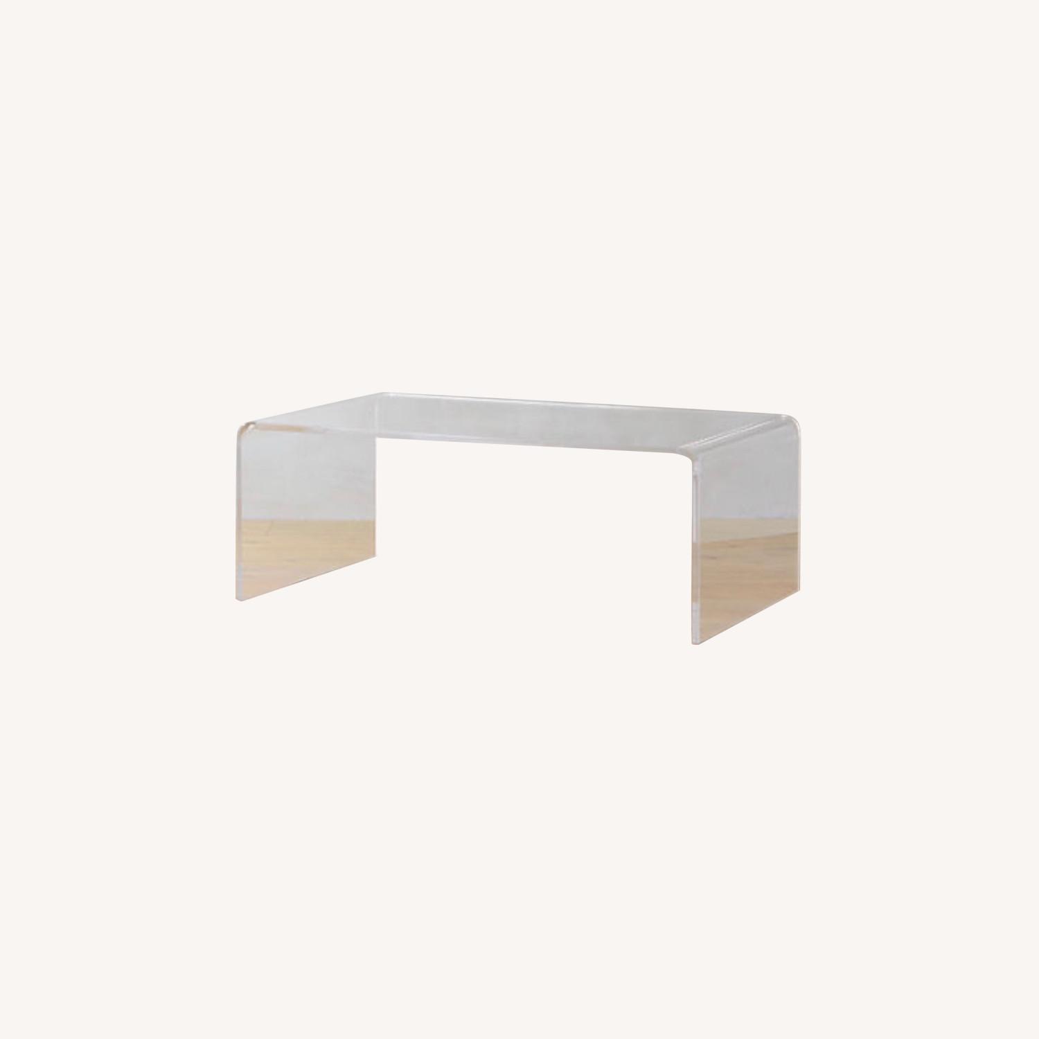 CB2 Peekaboo Acrylic Coffee Table AptDeco