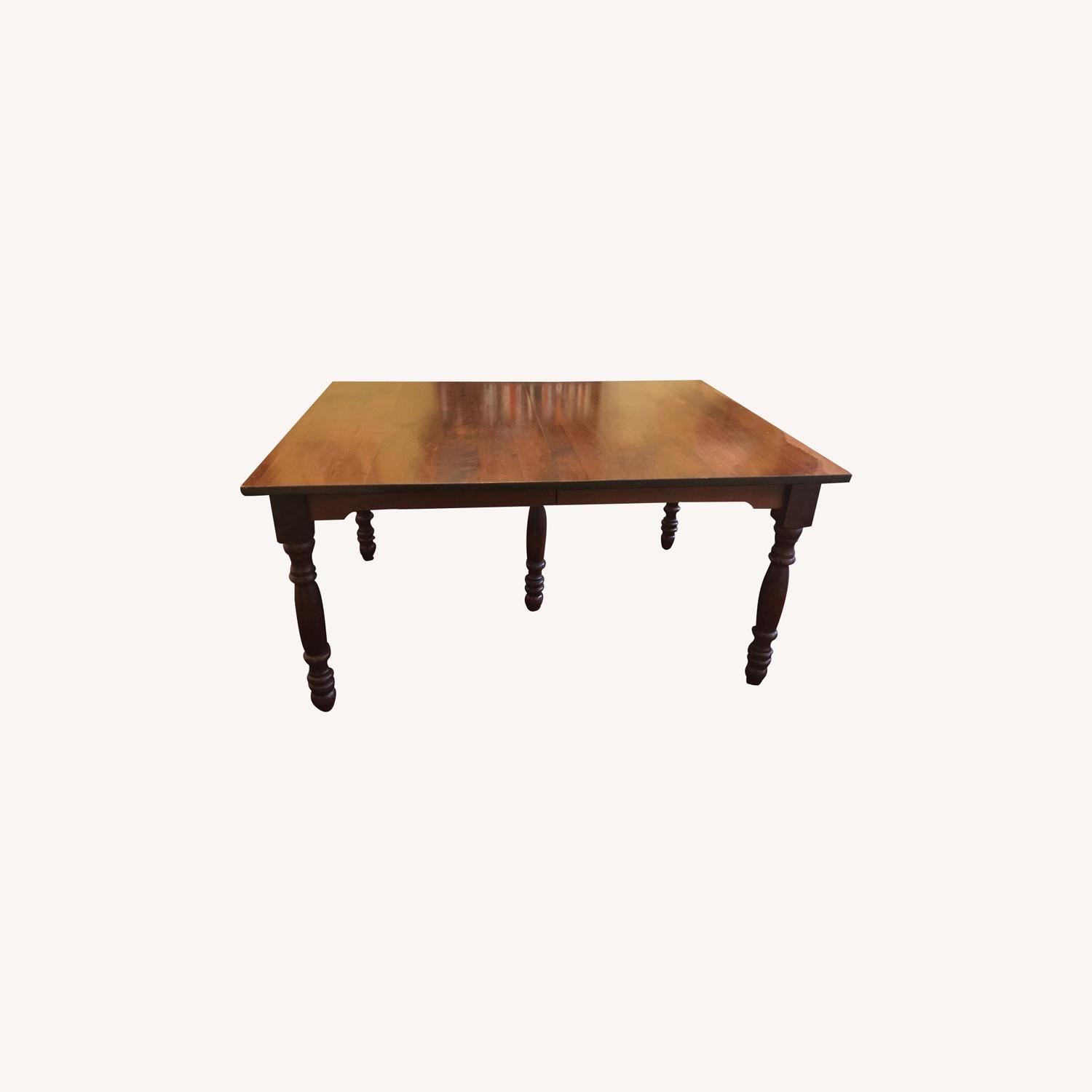 Solid cherry Dining Table w/4 self-stored leaves - AptDeco