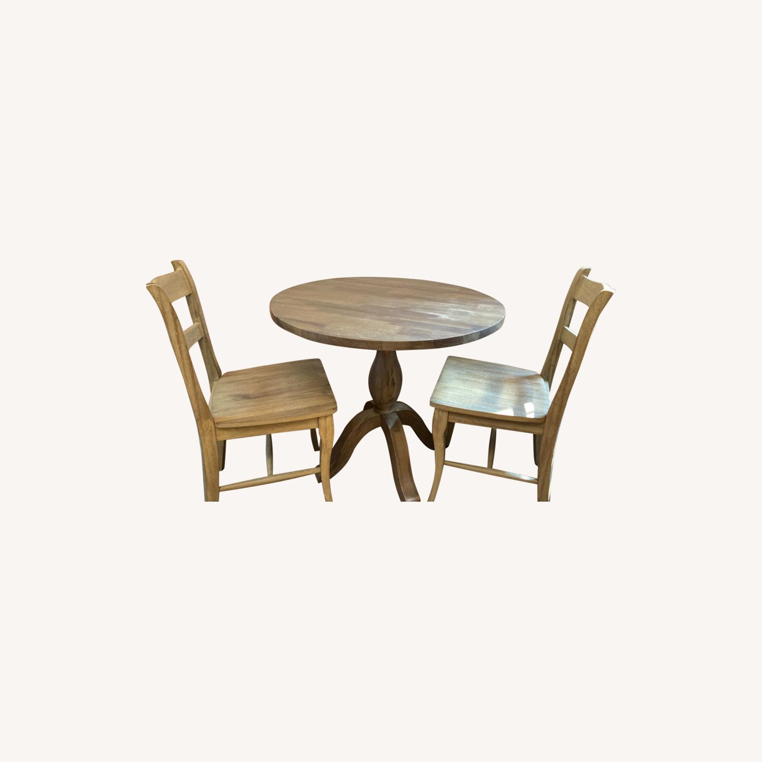 World Market Wood Table and Two Chairs AptDeco