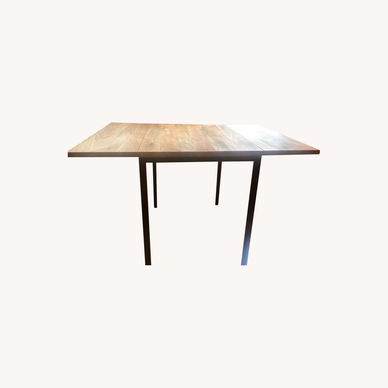 West Elm Mango Wood Drop Leaf Dining Table AptDeco