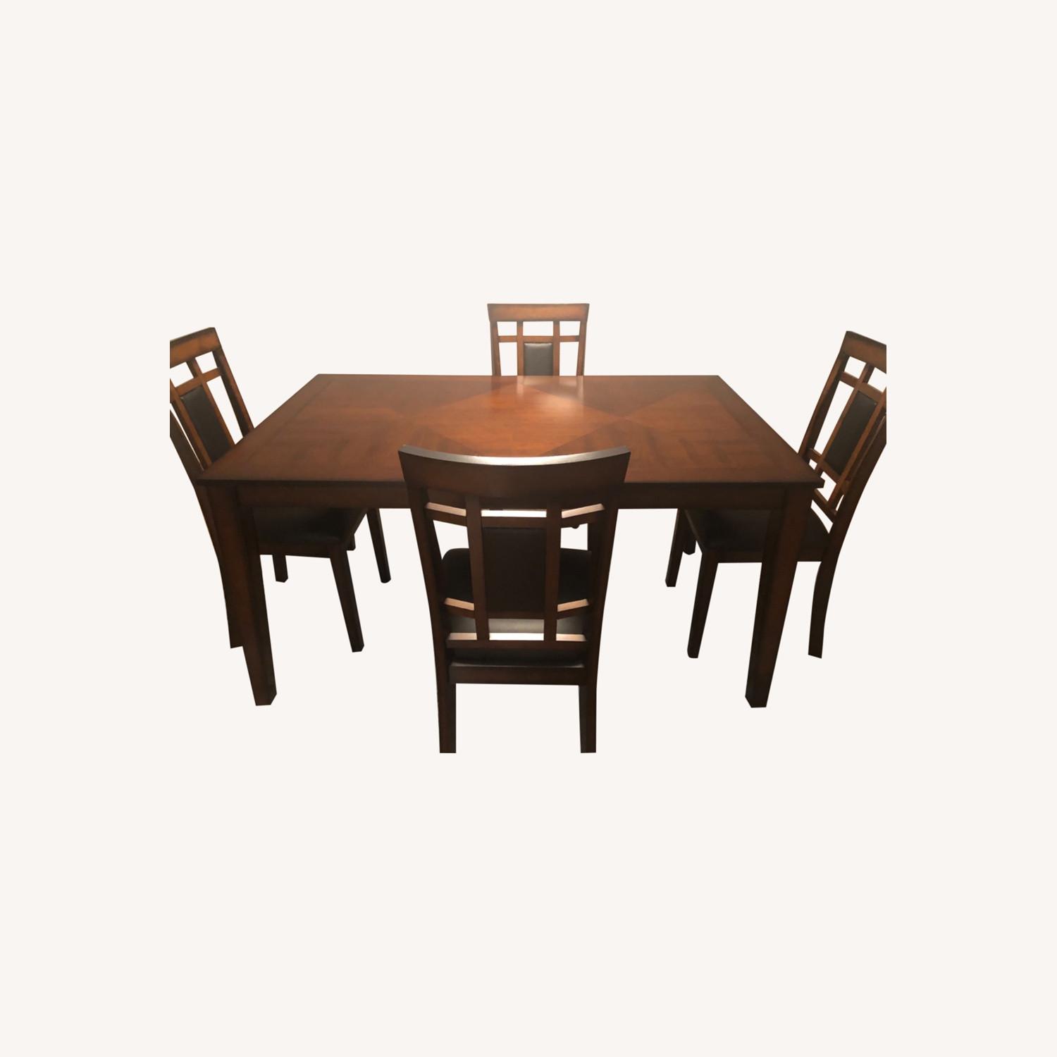 Dark Brown Dining Table and Chairs - AptDeco