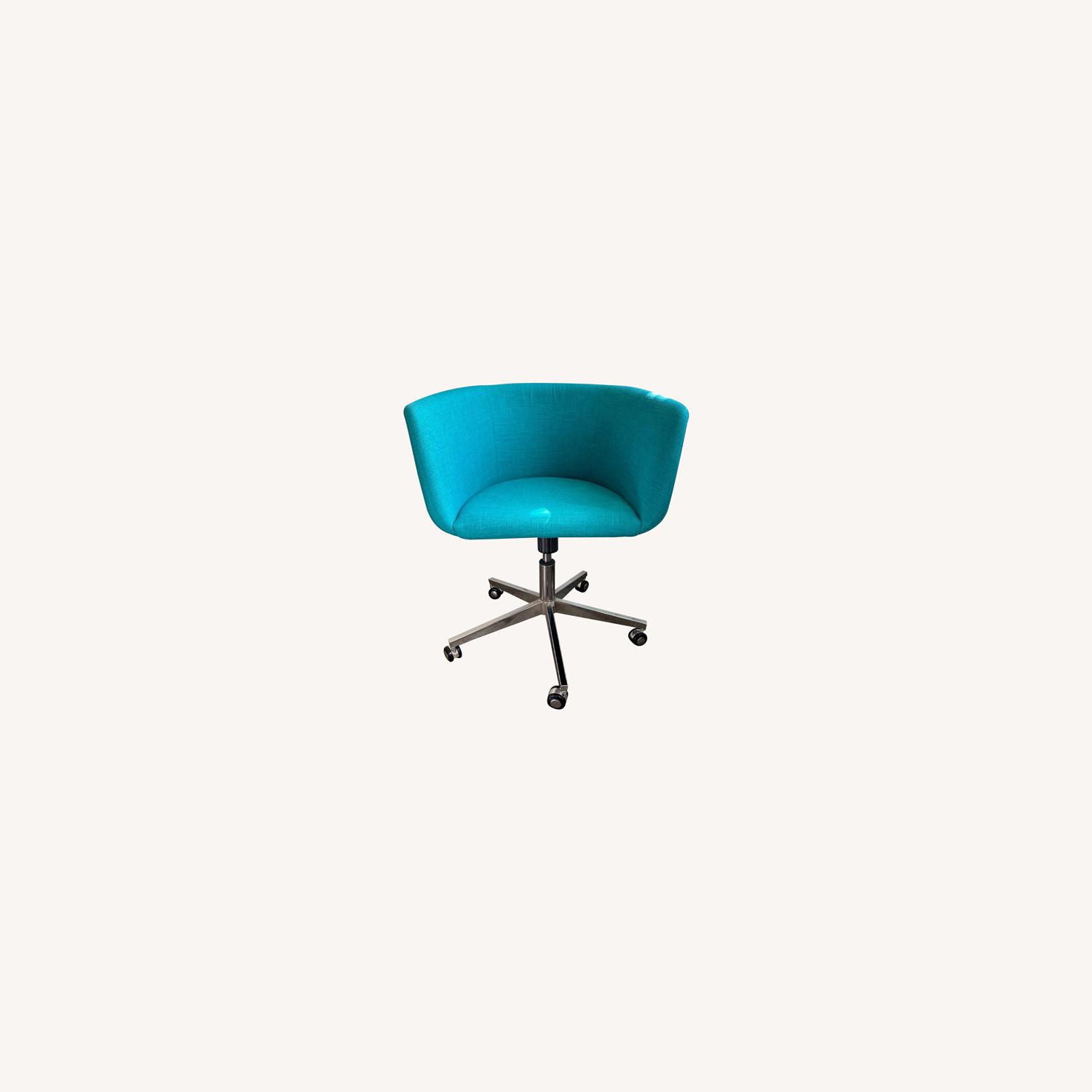 Turquoise Swivel Chair - image-0
