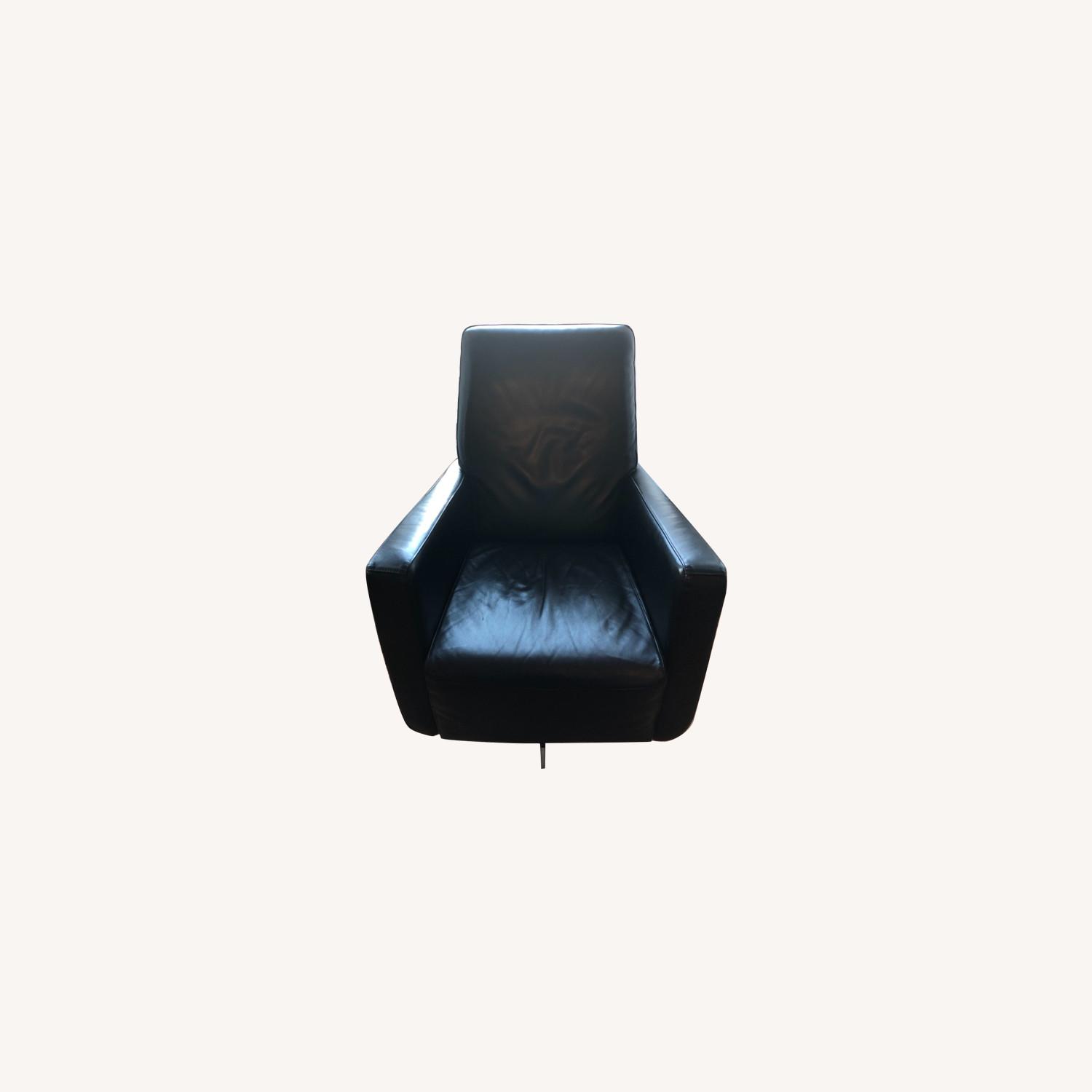 Natuzzi Black Leather Swivel Chair with Ottoman - image-0