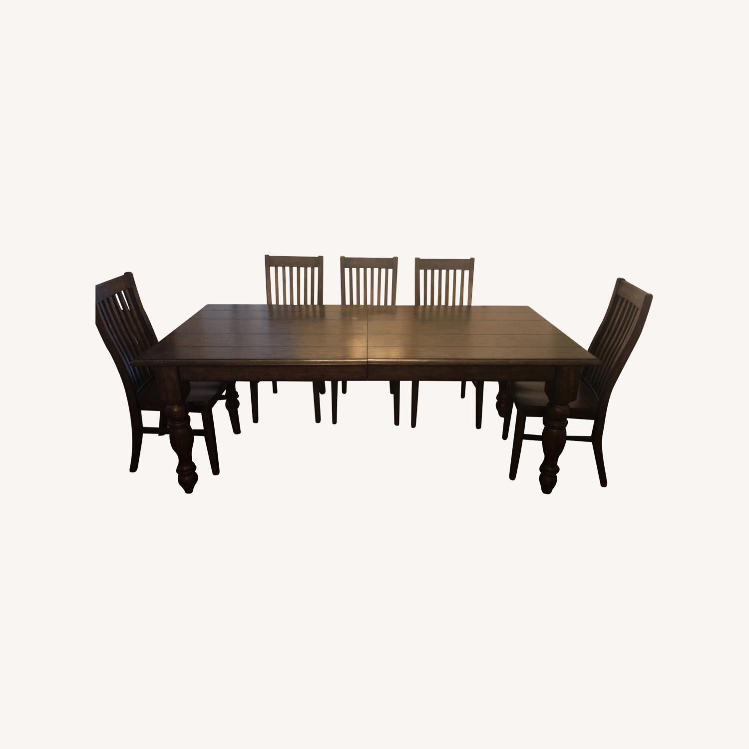 Pottery Barn Dark Brown Dining Room Set - image-0