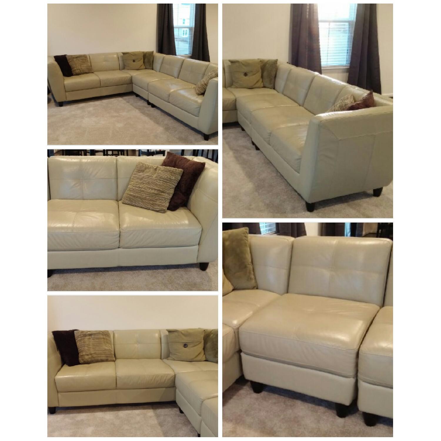Raymour & Flanigan Leather Sectional Sofa - AptDeco
