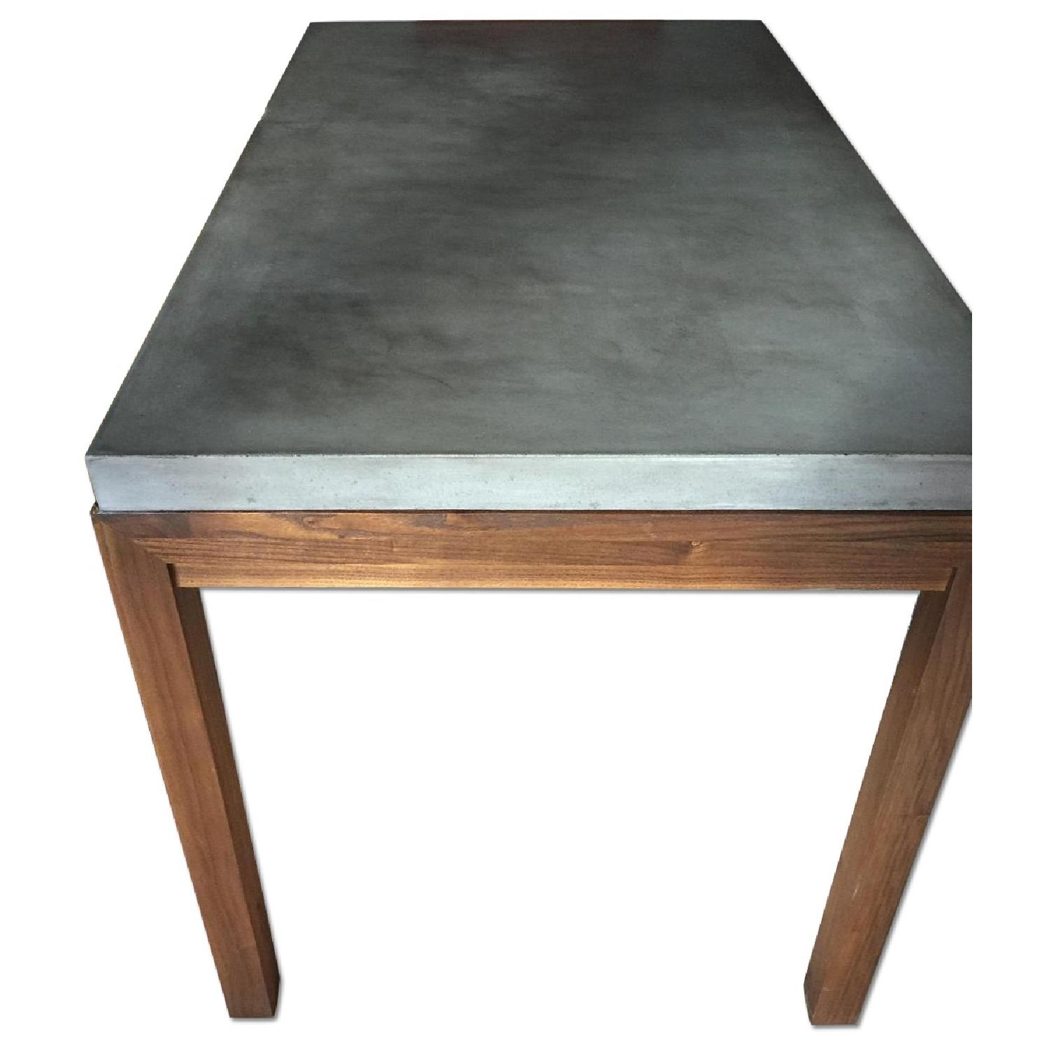 Crate & Barrel Concrete Top Dining Table AptDeco