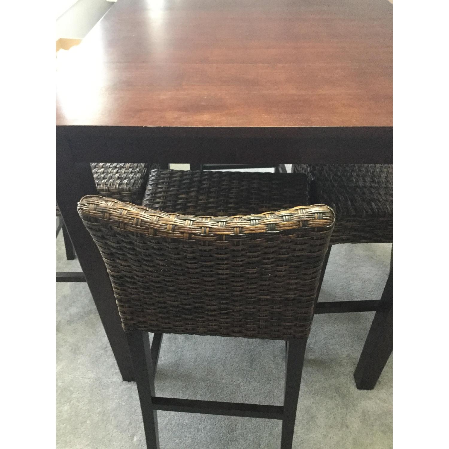 Wooden Pub table w/ 4 Wicker High Chairs AptDeco