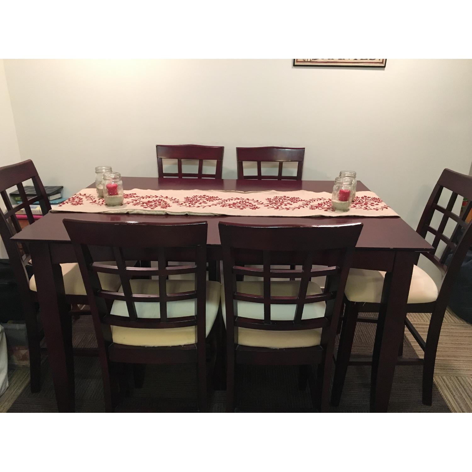 Bob's Cherry Wood Dining Table w/ 8 Chairs AptDeco