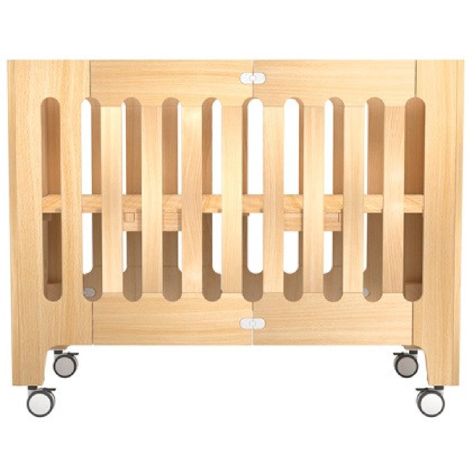 bloom folding crib