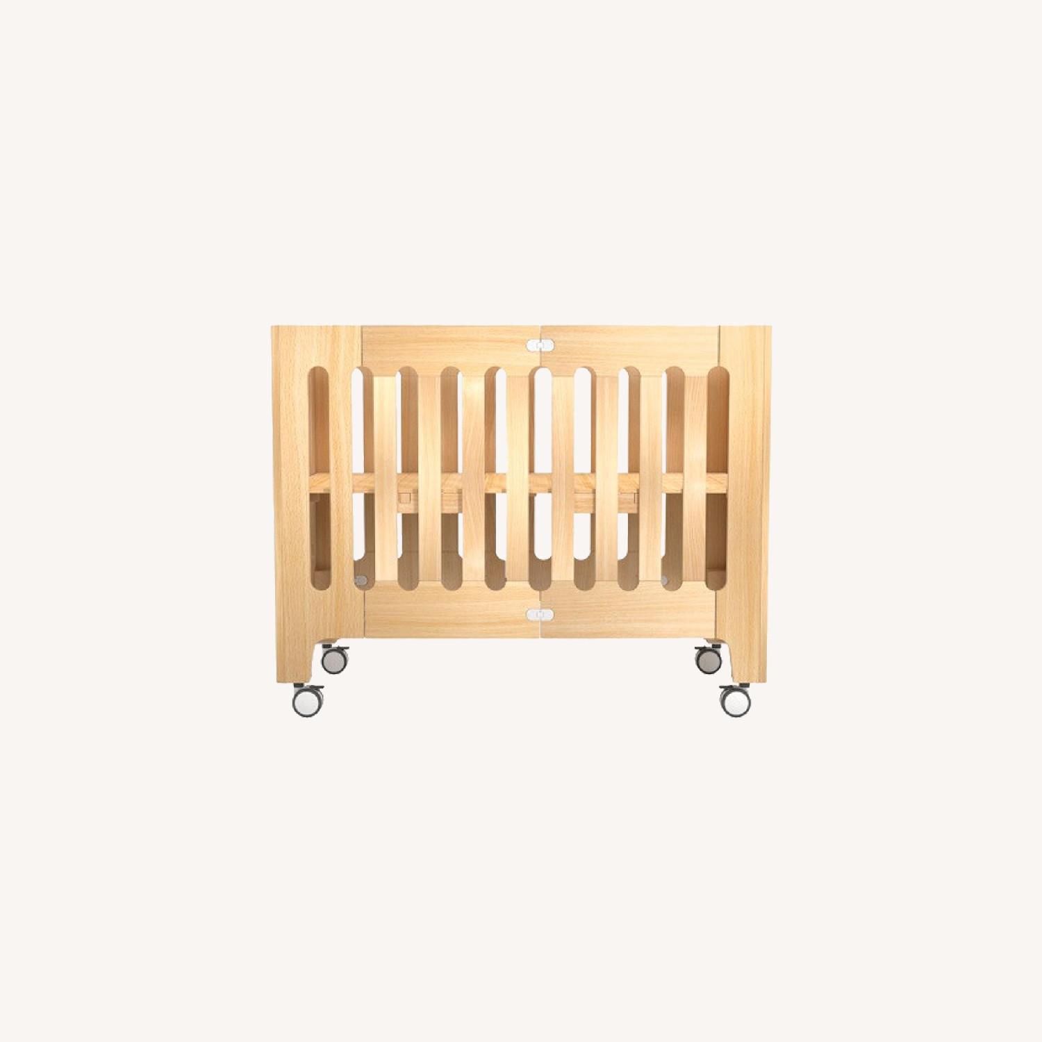 Bloom Alma Papa Convertible Folding Crib AptDeco