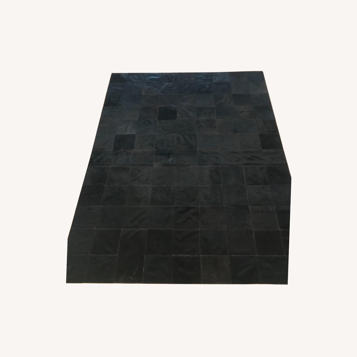 Handmade Black Cowhide Patch Rug Approx 6 by 8 - image-0