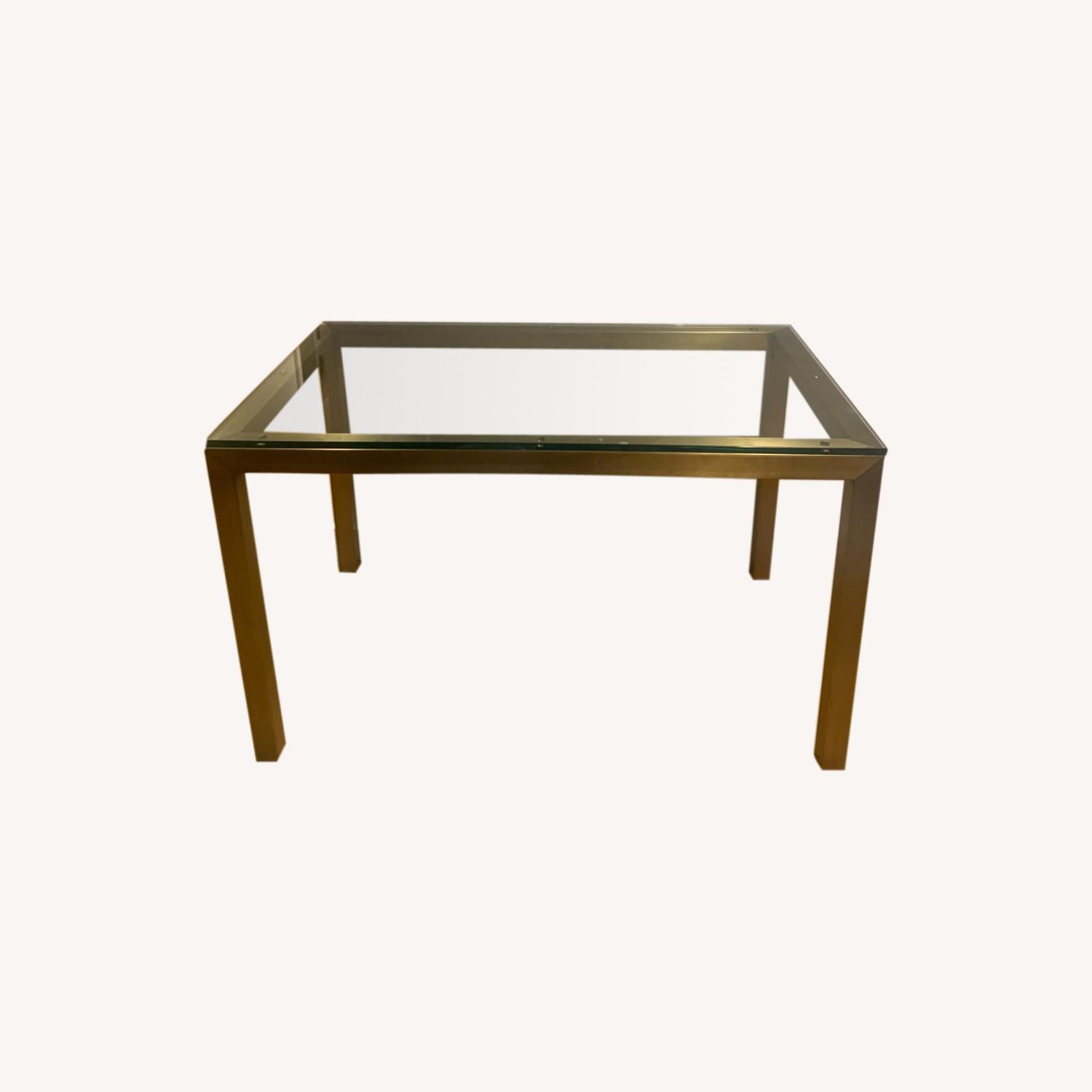 West Elm Glass Top Dining Table with Brass Legs AptDeco