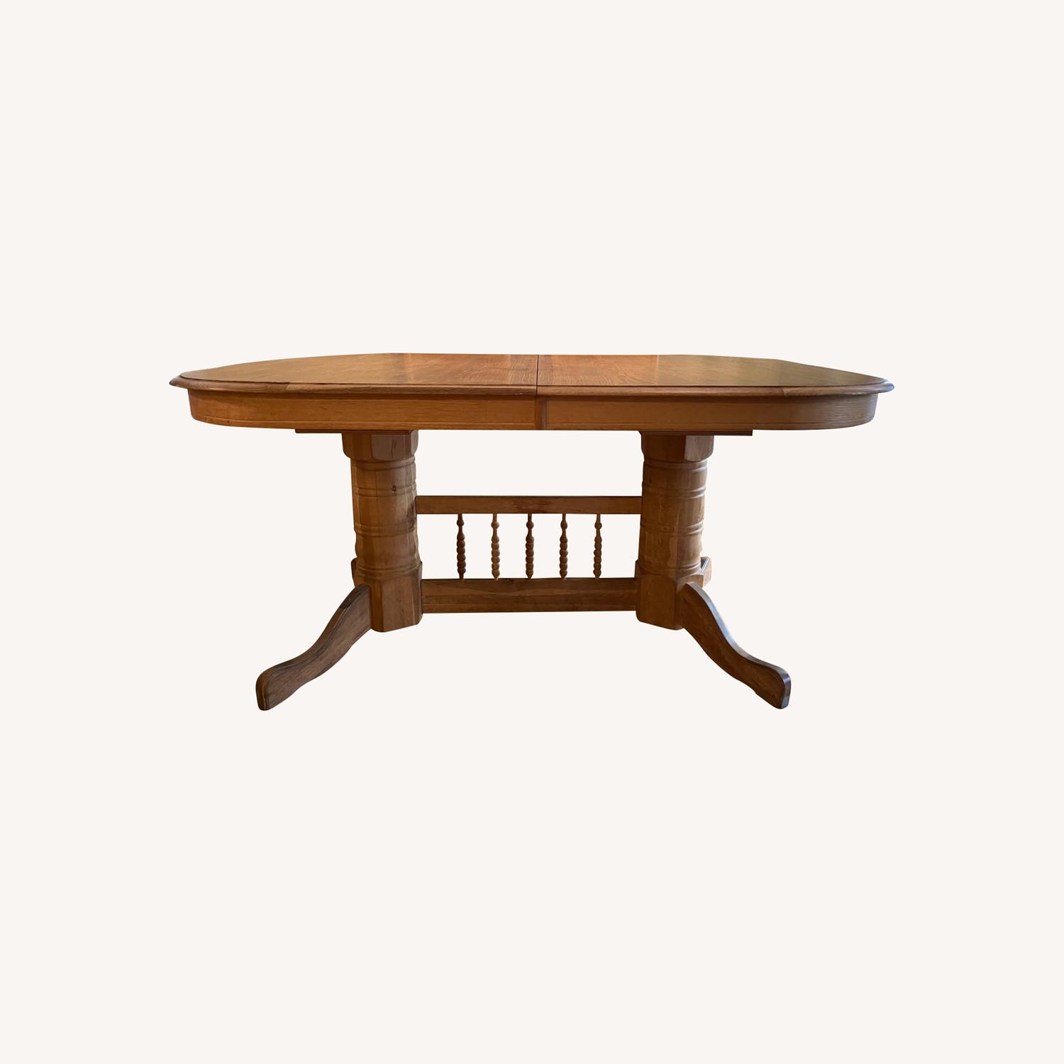 Sturdy Solid Oak Dining Table - Expandable - AptDeco