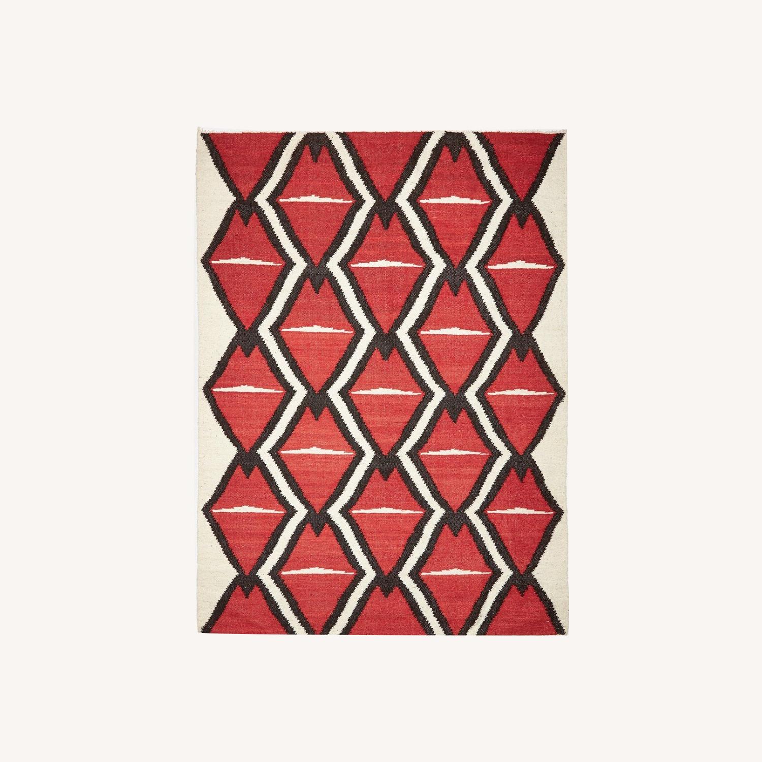Elle Raspberry Decor Rug Artisan Rug featured in Elle Decor - AptDeco